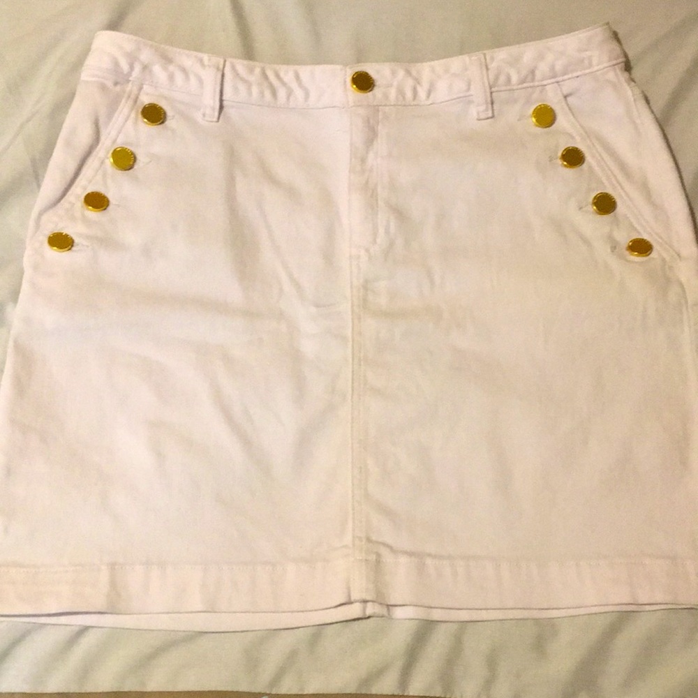 Michael Kors white mini skirt with gold buttons and back pockets